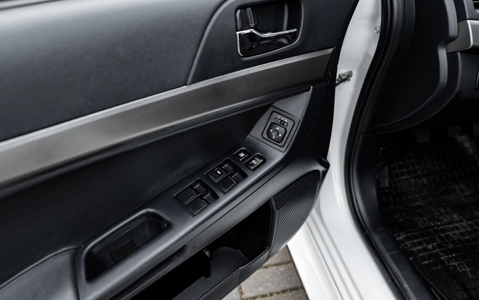 Mitsubishi Lancer cena 32900 przebieg: 150000, rok produkcji 2014 z Radom małe 596
